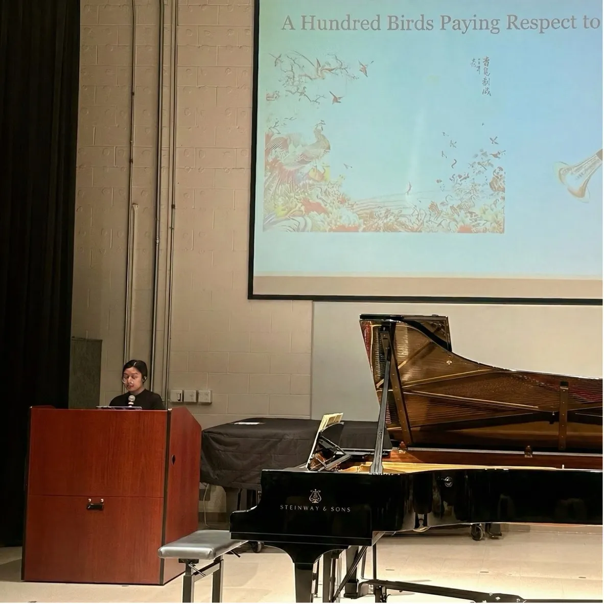 Yingqi Wang presenting a lecture-recital